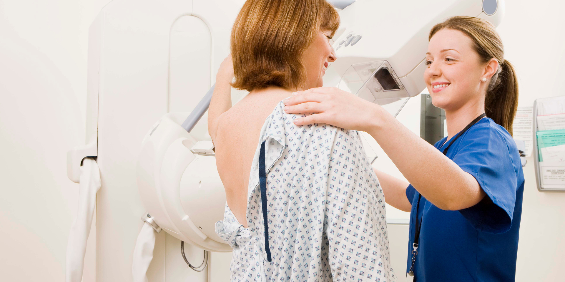woman getting mammogram