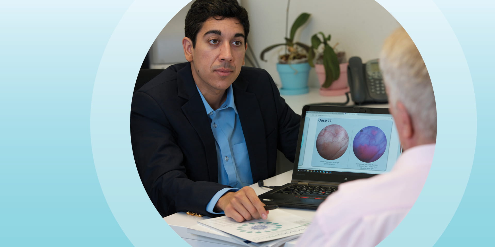 doctor shows images to patient on lap top