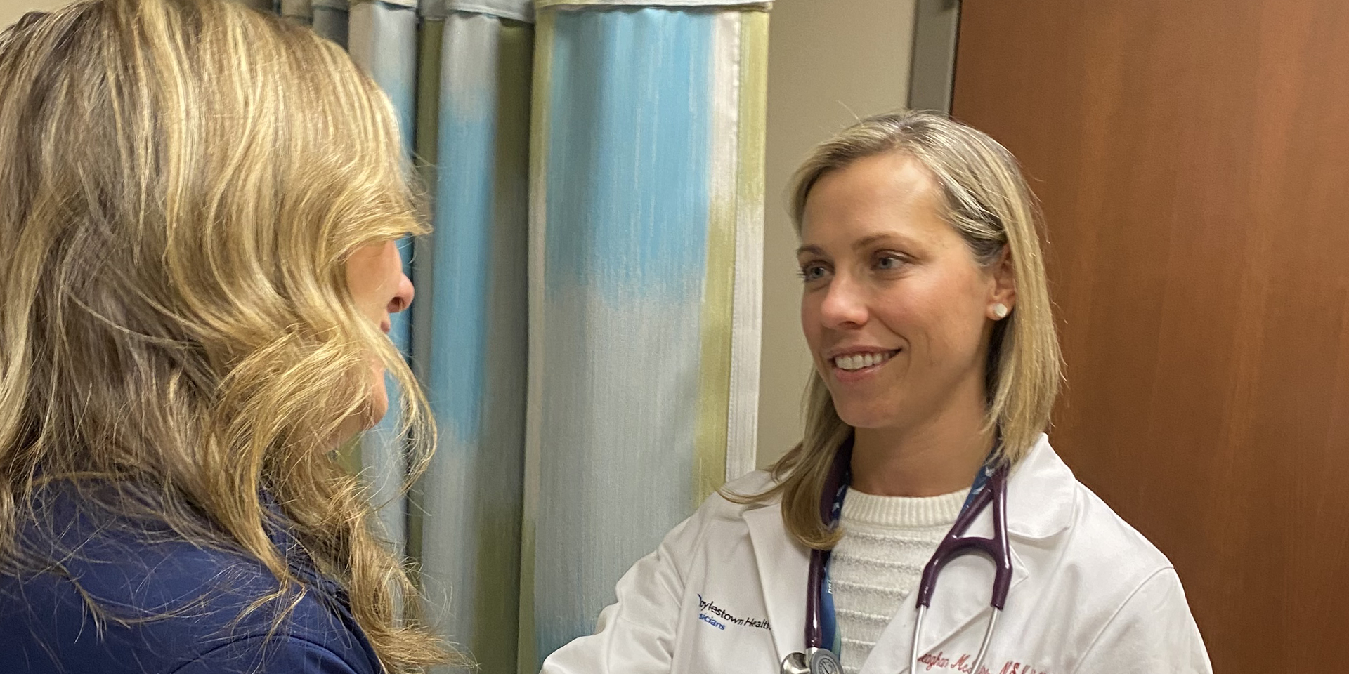 Meaghan McGuire, MSN, CRNP-c with a Cancer Survivor | Doylestown Health