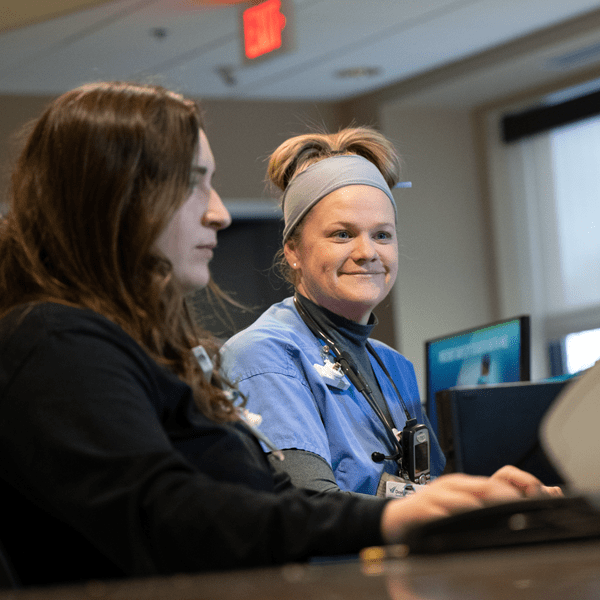 Associates entering patient data in their records | Doylestown Health
