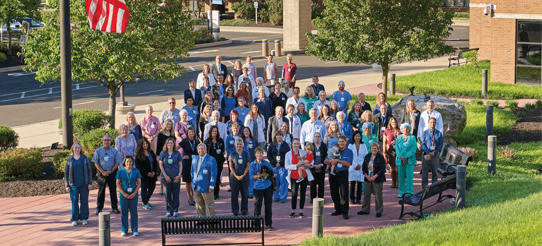 Employees posing in front of the Doylestown Hospital| Doylestown Health