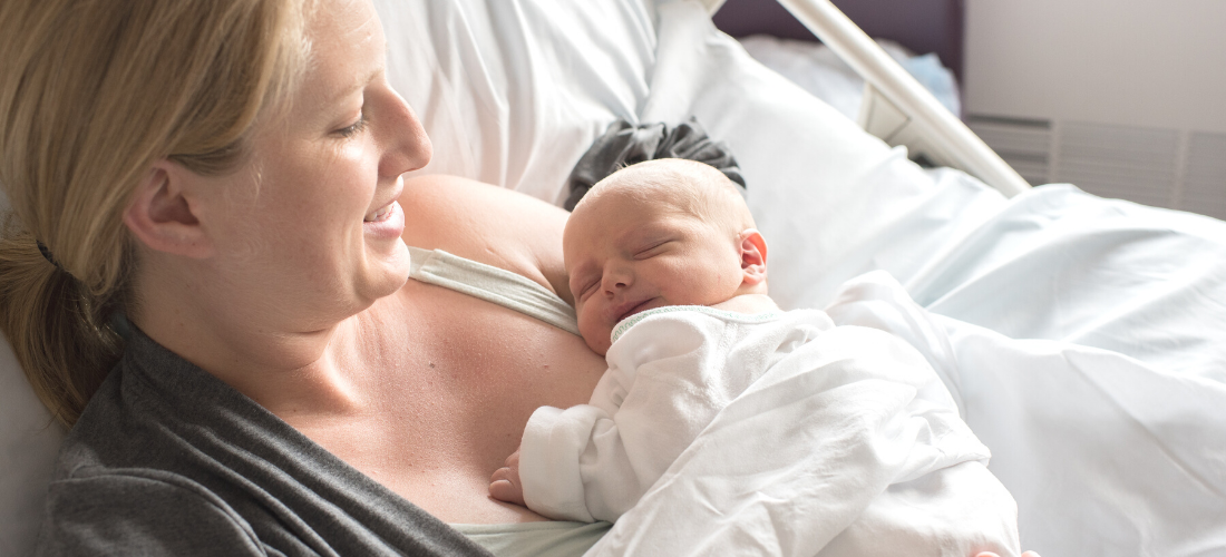 Mother holding a newborn | Doylestown Health